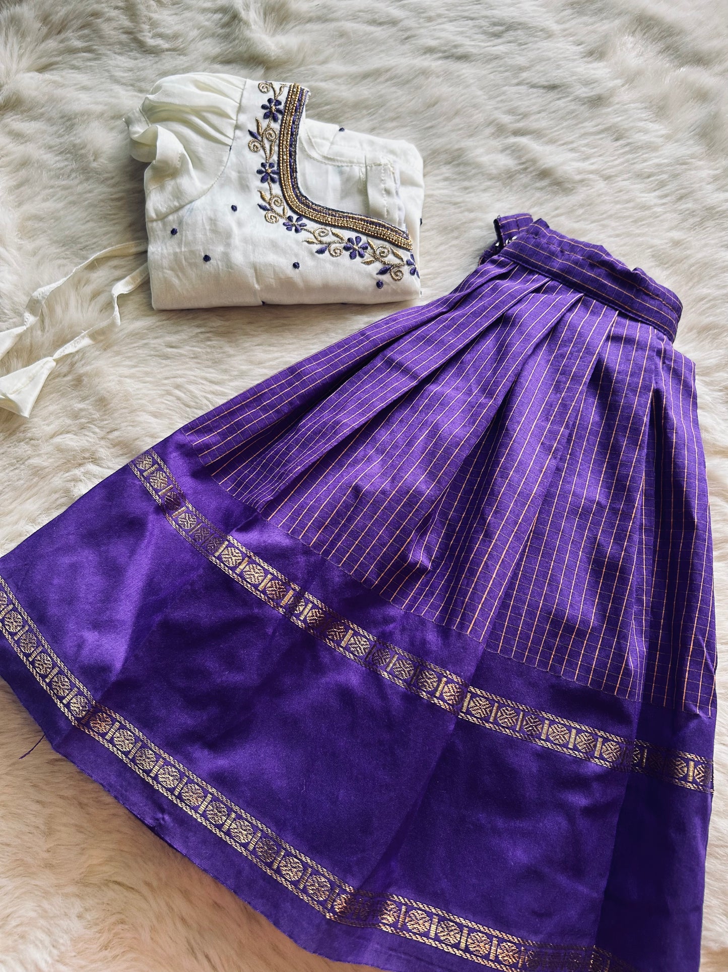 Purple Chequered Pattu Pavadai with White Embroidered Blouse – Traditional Dress for Kids