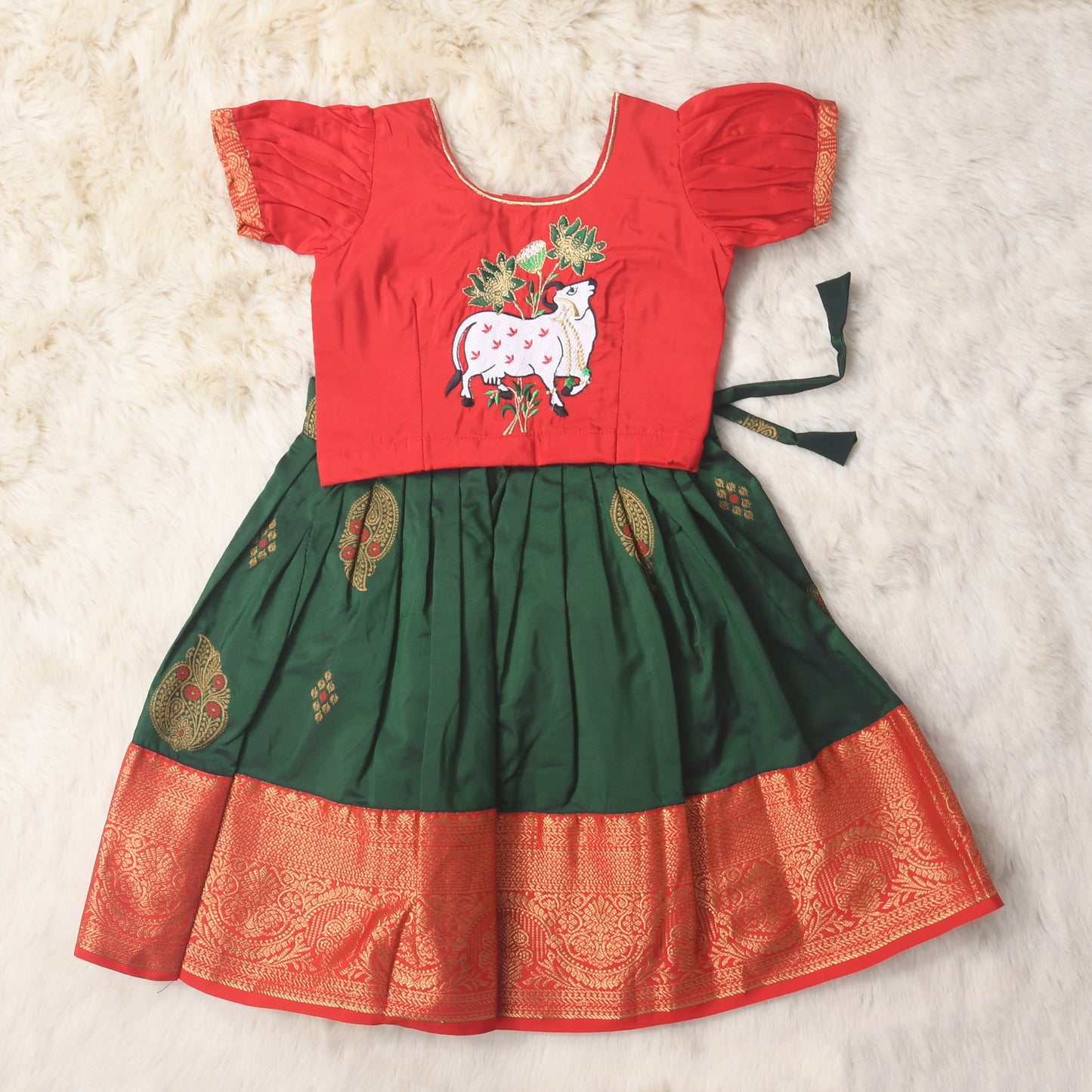Kaushiki - Saffron orange and lush green traditional langa blouse kamadenu cow embroidered zari border ethnic wear pattu pavadai silk for baby girl