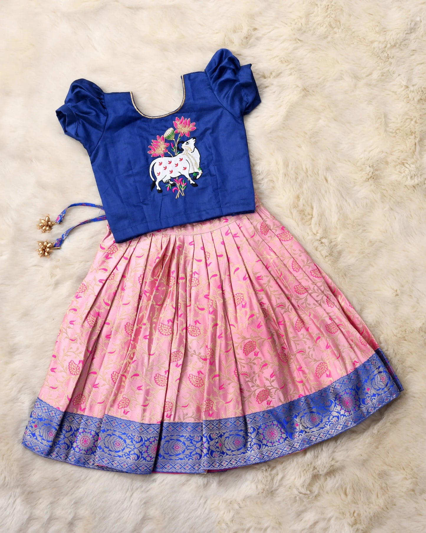 Peachish pink and navy blue traditional langa blouse kamadenu cow embroidered zari border ethnic wear pattu pavadai silk for baby girl