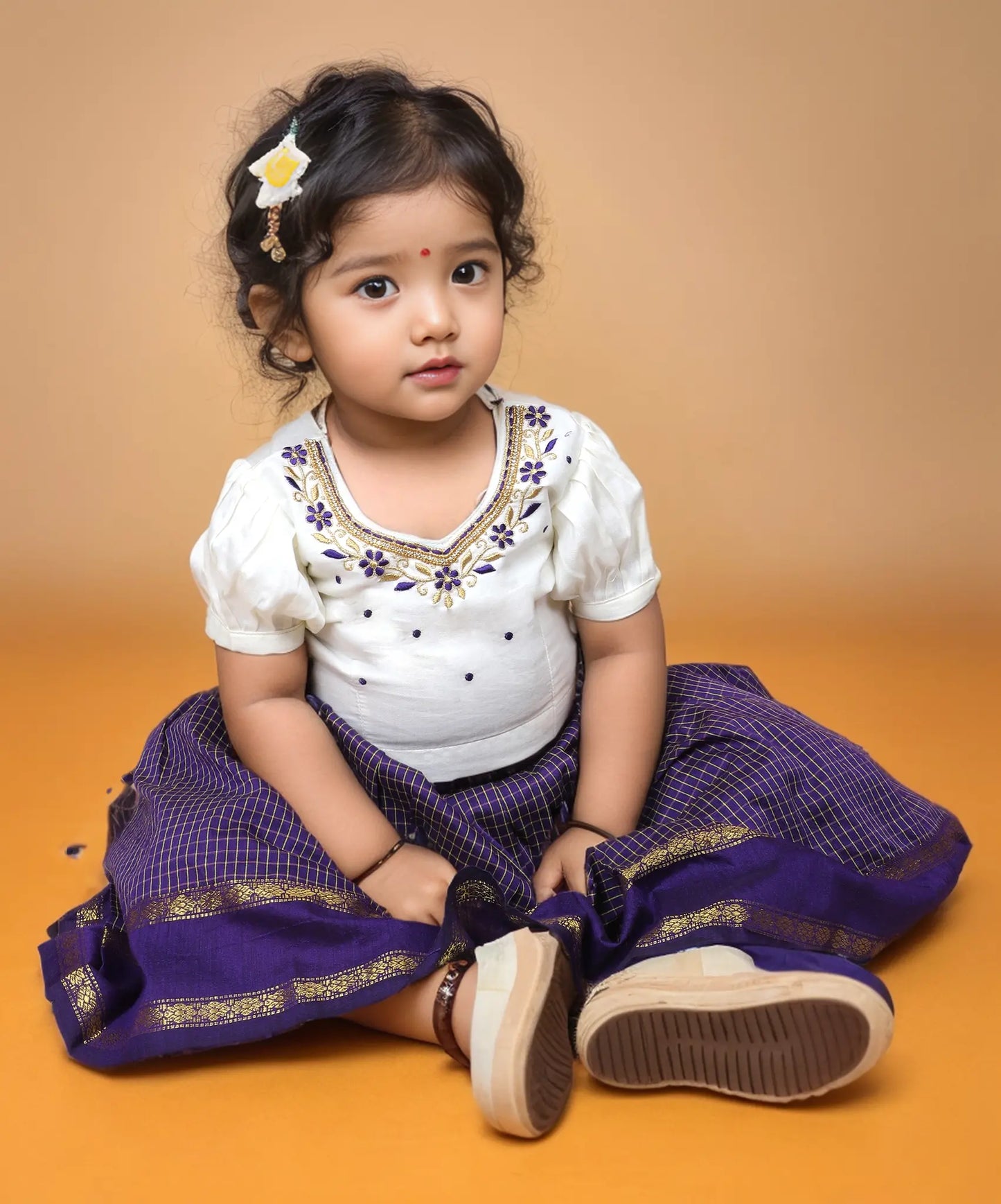 Purple Chequered Pattu Pavadai with White Embroidered Blouse – Traditional Dress for Kids