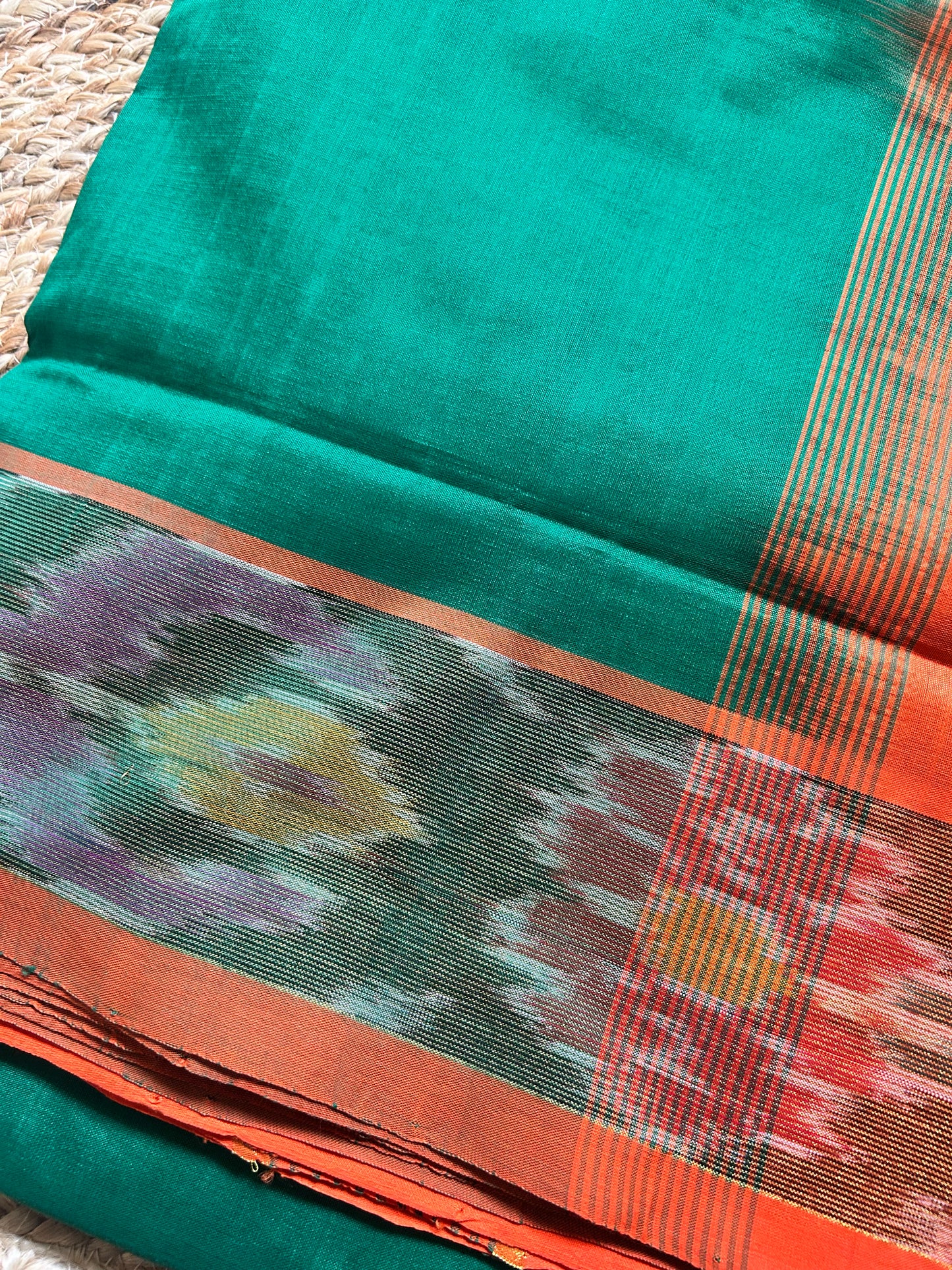 Green Handloom Silk Cotton Saree with Orange Ikat Border & Rich Pallu