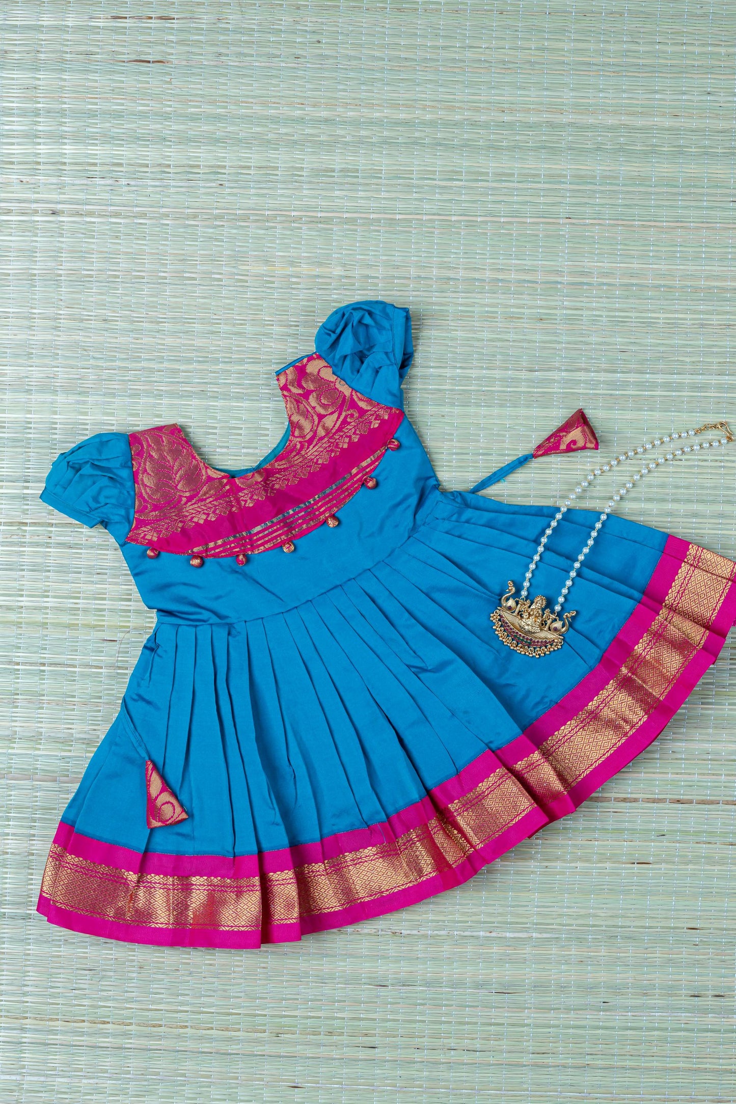 Silk ethnic wear for baby girl with buff sleeves