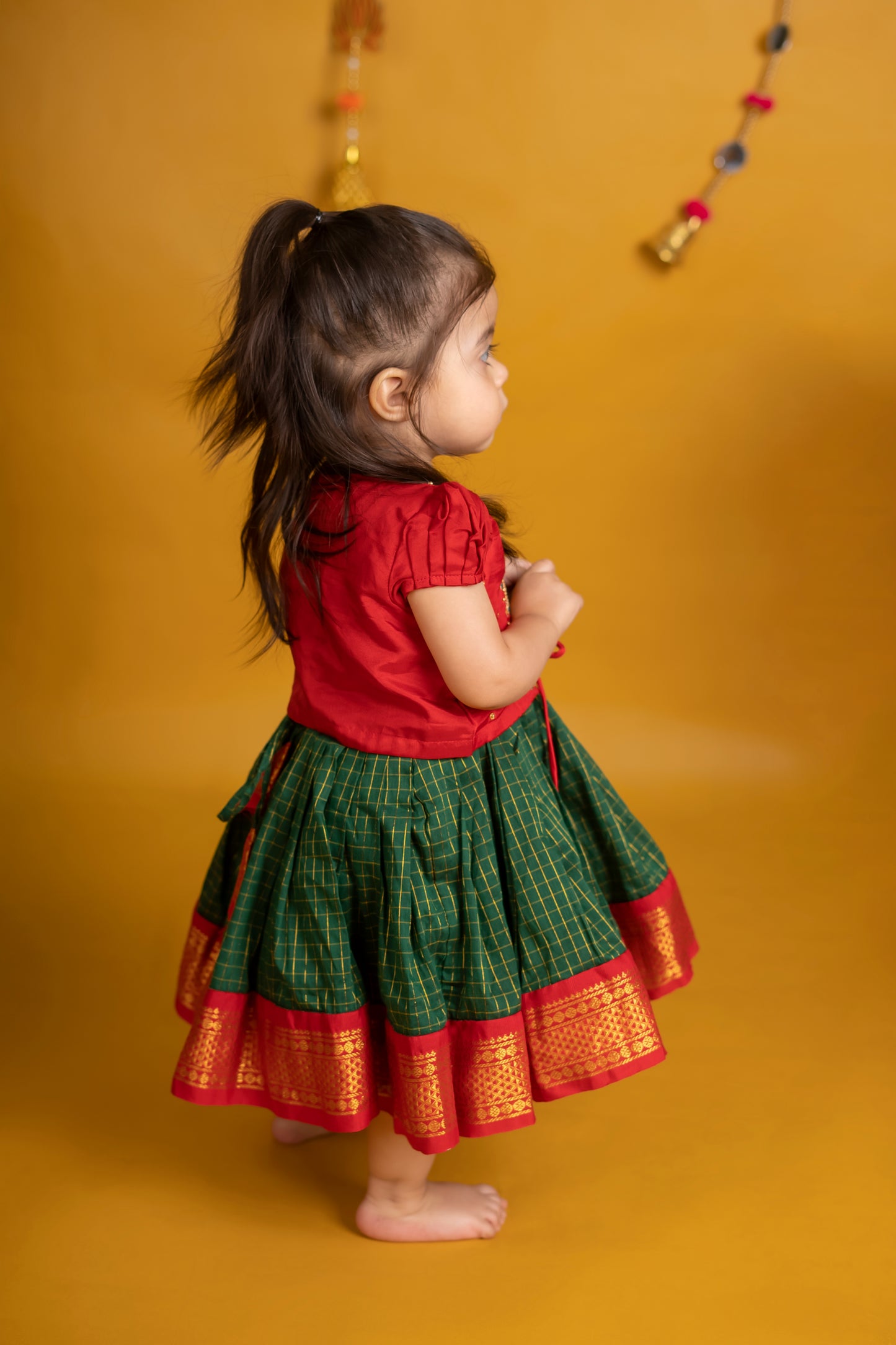 Traditional green and red checked langa jacket ethnic wear for baby girl