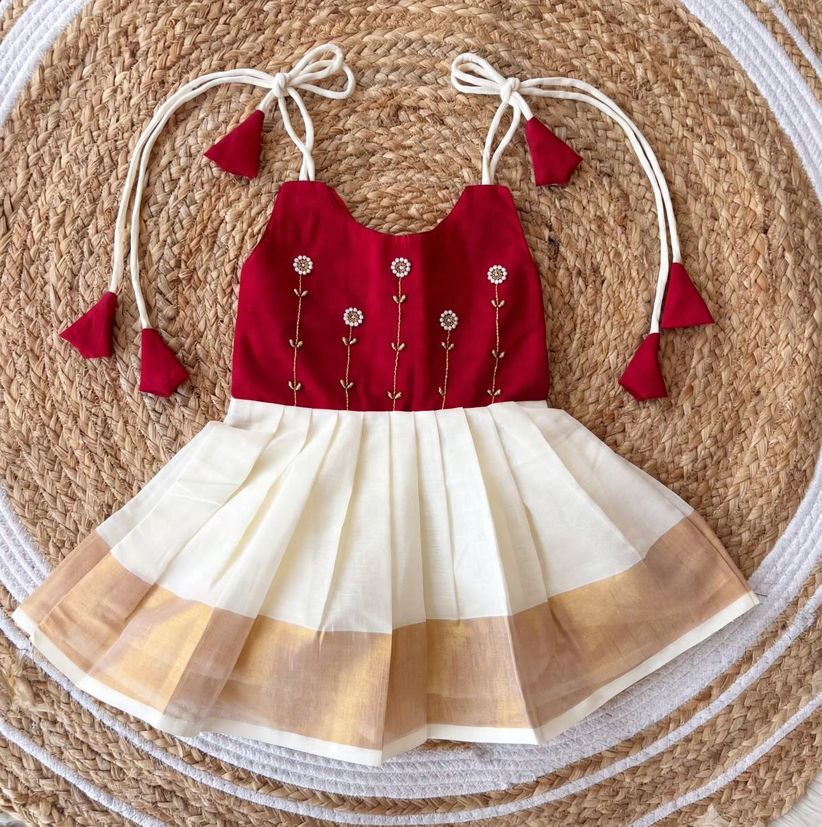 Red sunflower embroidery with white tie up frock for baby girl