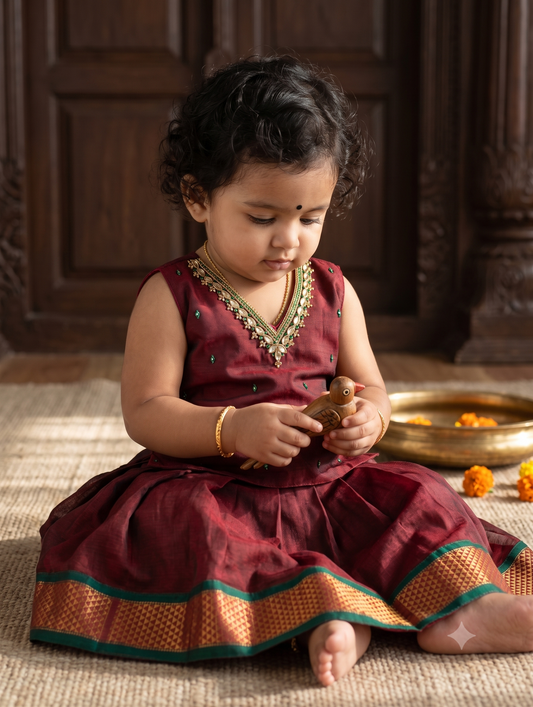 ಗಾಢ ಕೆಂಪು (Maroon) kanchi silk cotton sleeveless heritage langa blouse for baby girl