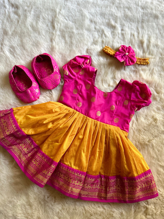 Pink and golden yellow vintage ethnic wear for baby girl with buff sleeves