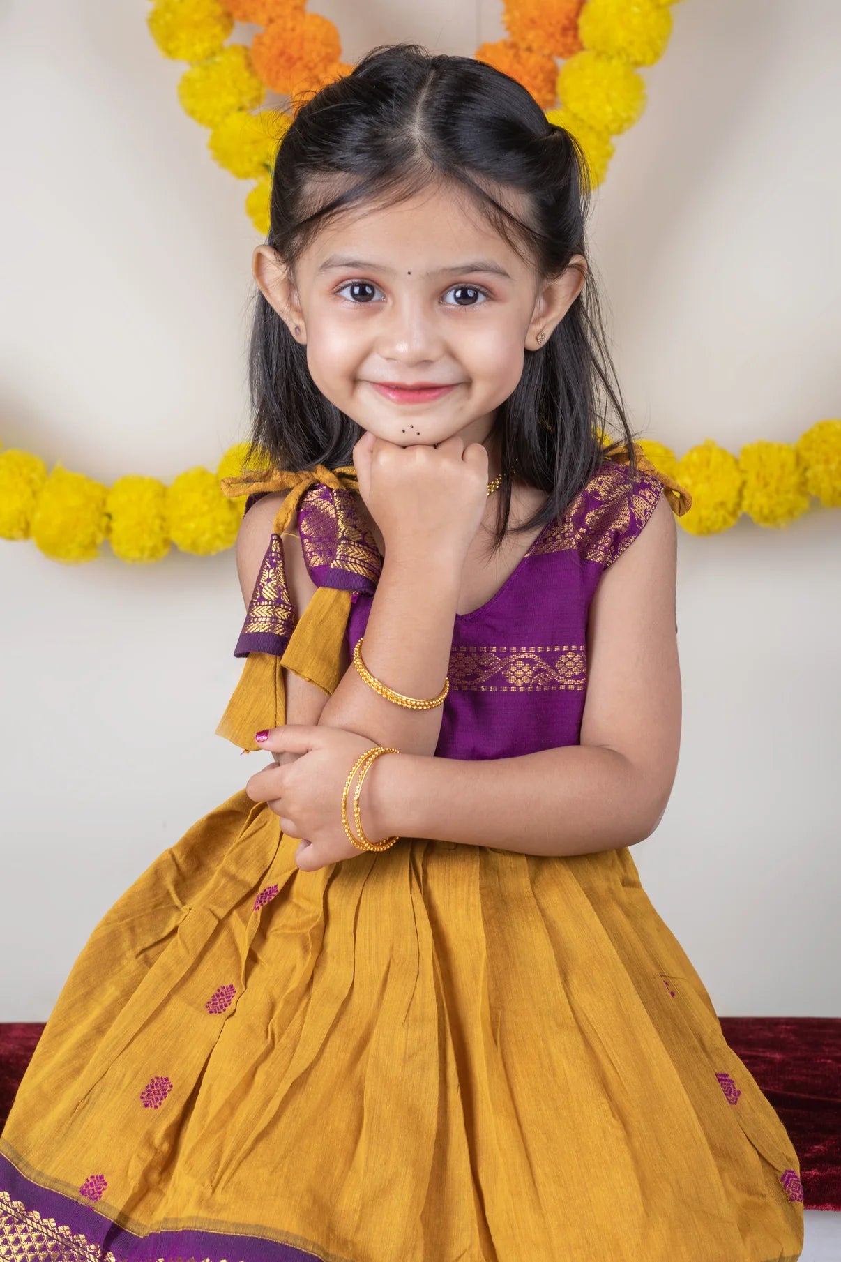 Turmeric yellow with mulberry combination tie up dress for baby girl
