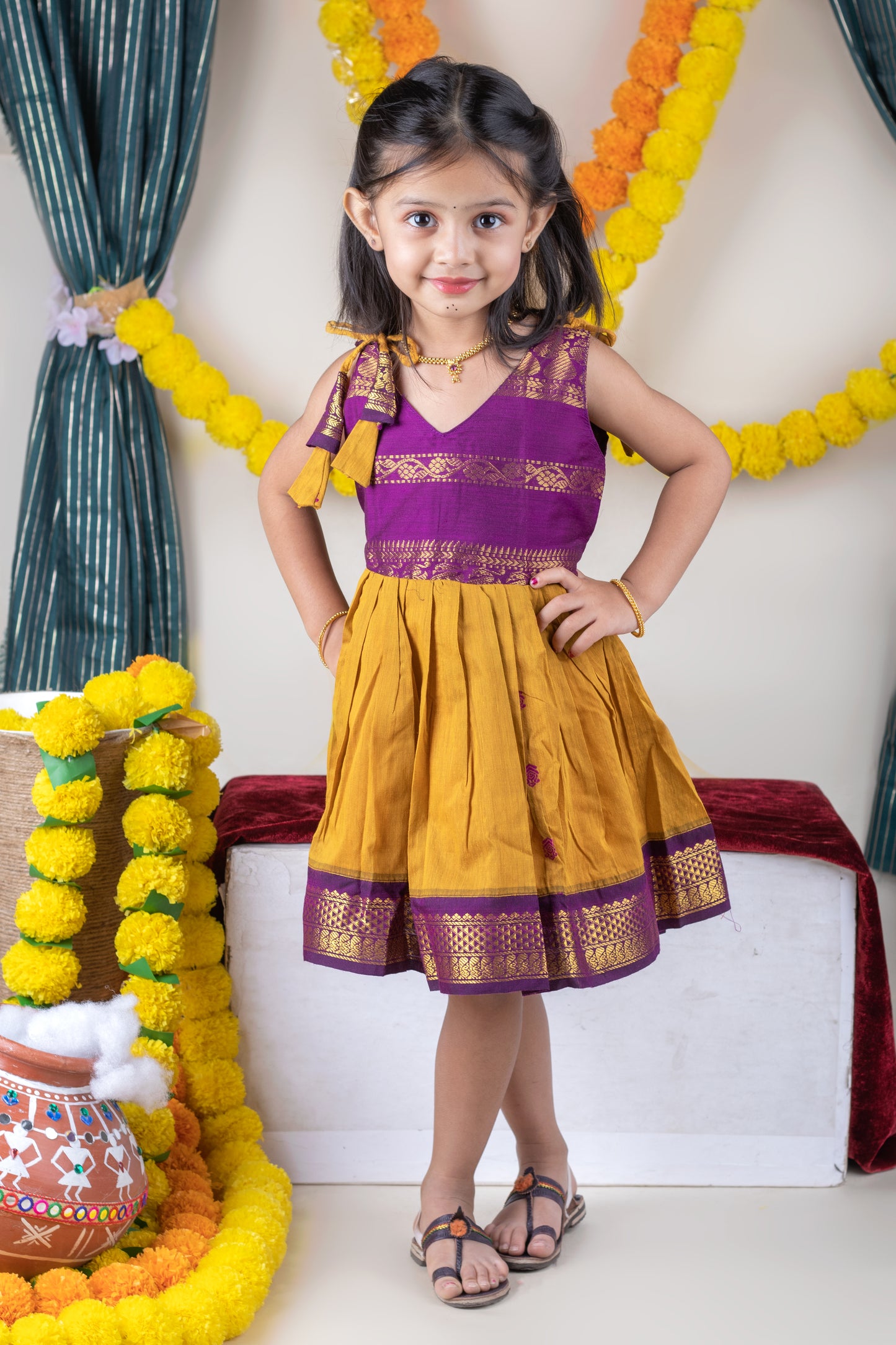 Turmeric yellow with mulberry combination tie up dress for baby girl