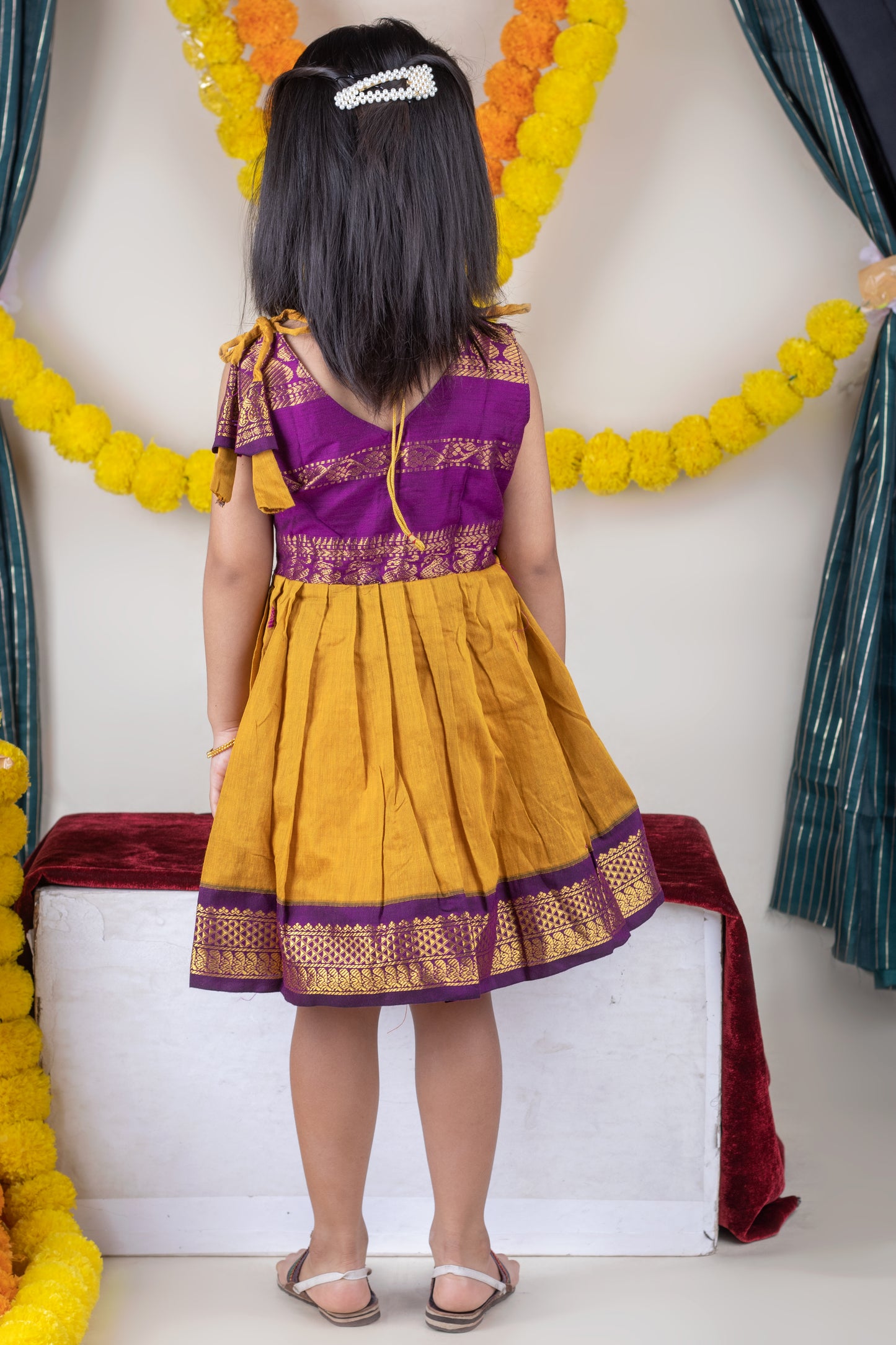 Turmeric yellow with mulberry combination tie up dress for baby girl