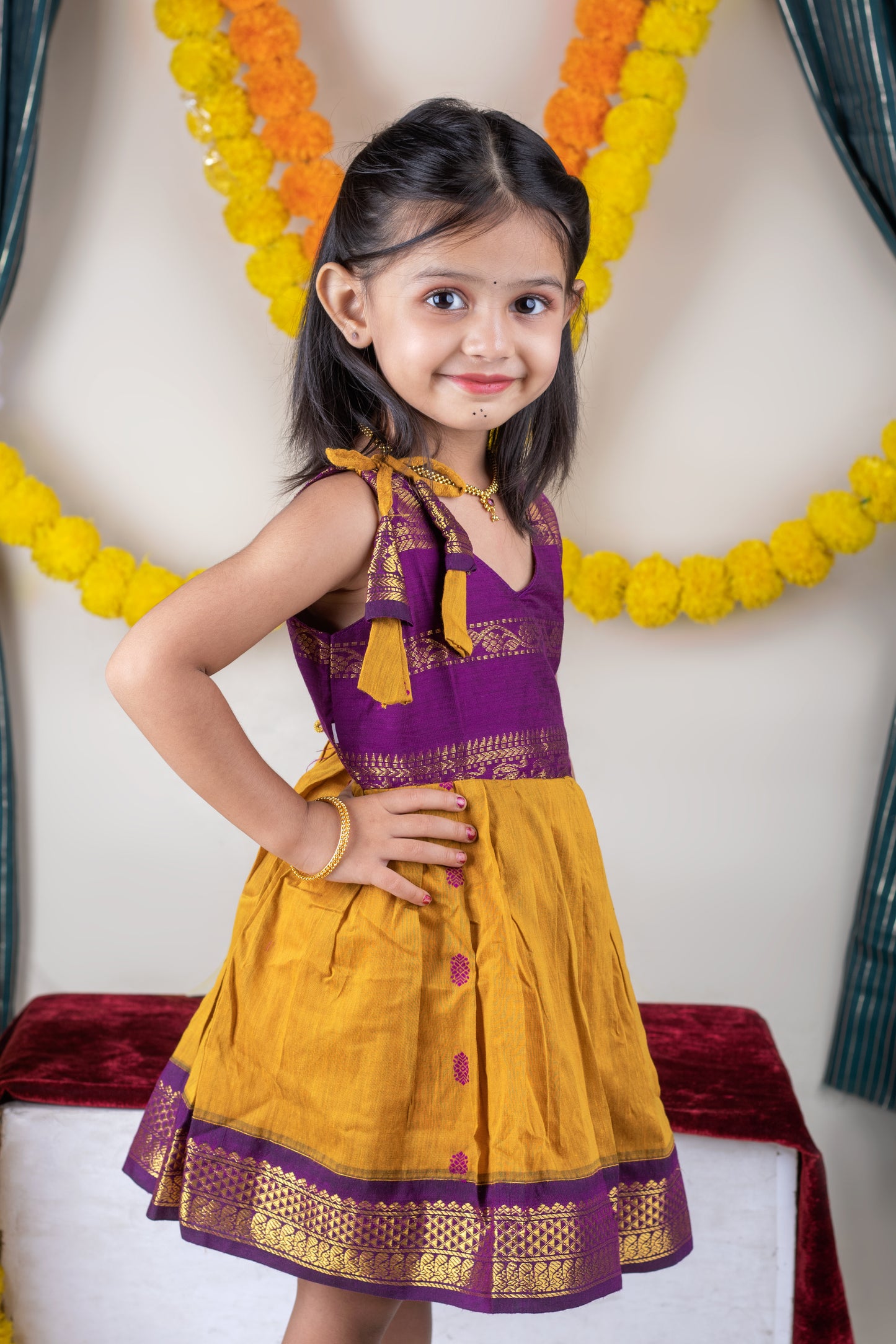 Turmeric yellow with mulberry combination tie up dress for baby girl