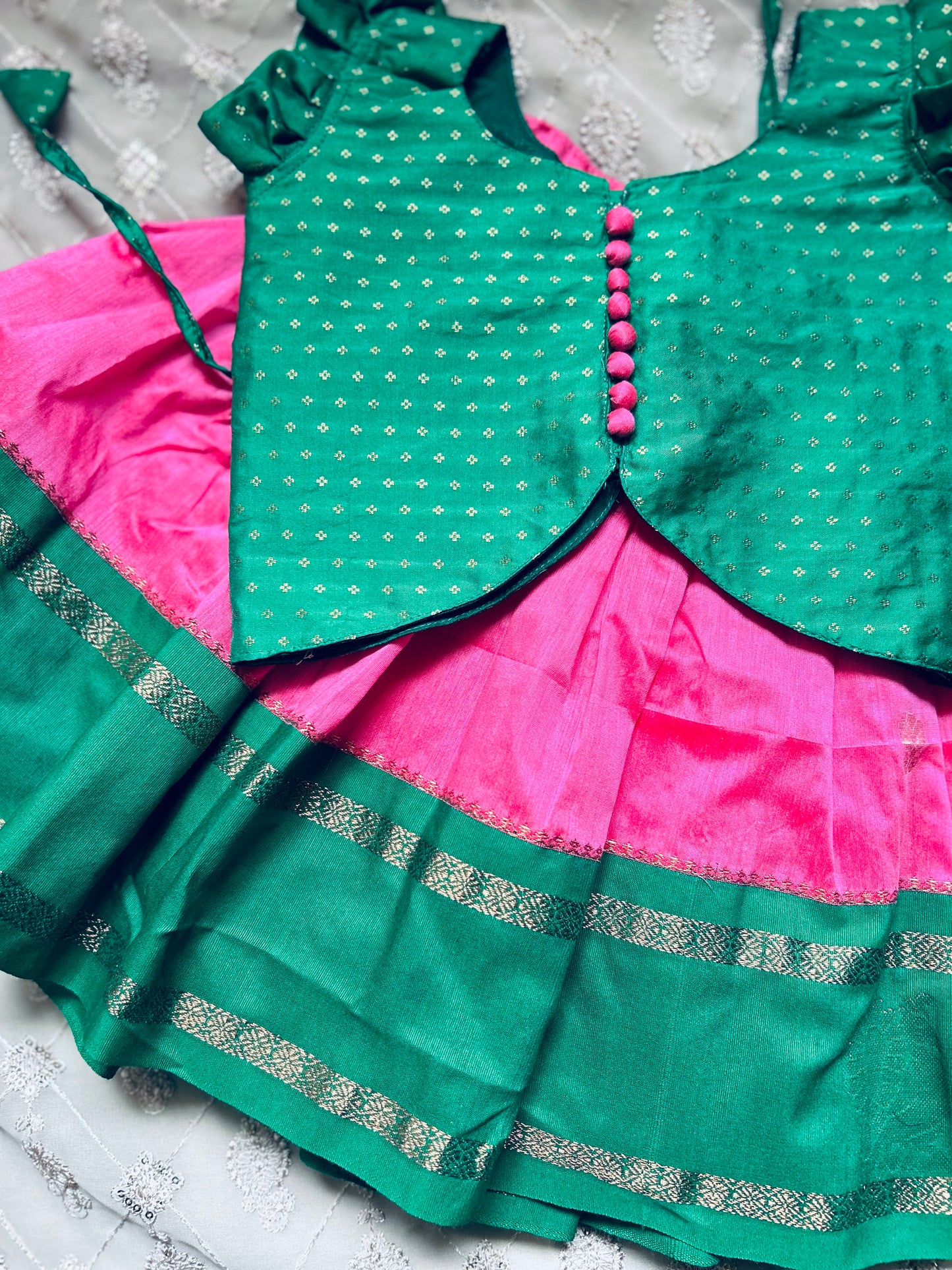 pink with green beautiful zari border langa blouse, pattu pavadai, lehenga for baby girl