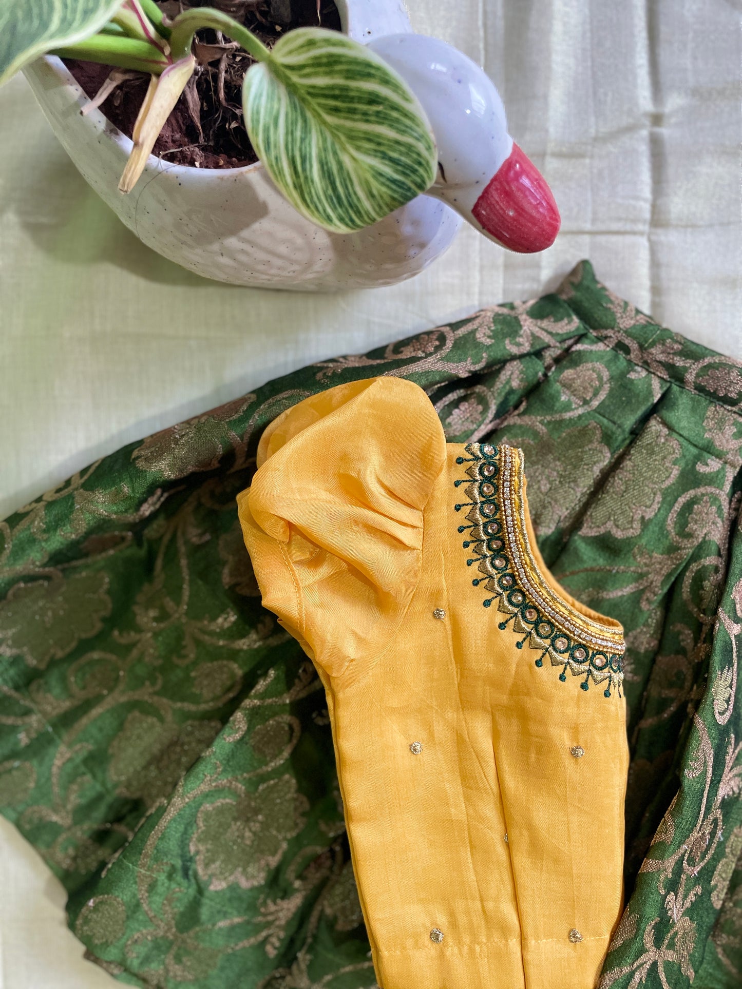 Golden yellow and mehendi green silk south indian ethnic wear langa blouse for baby girl