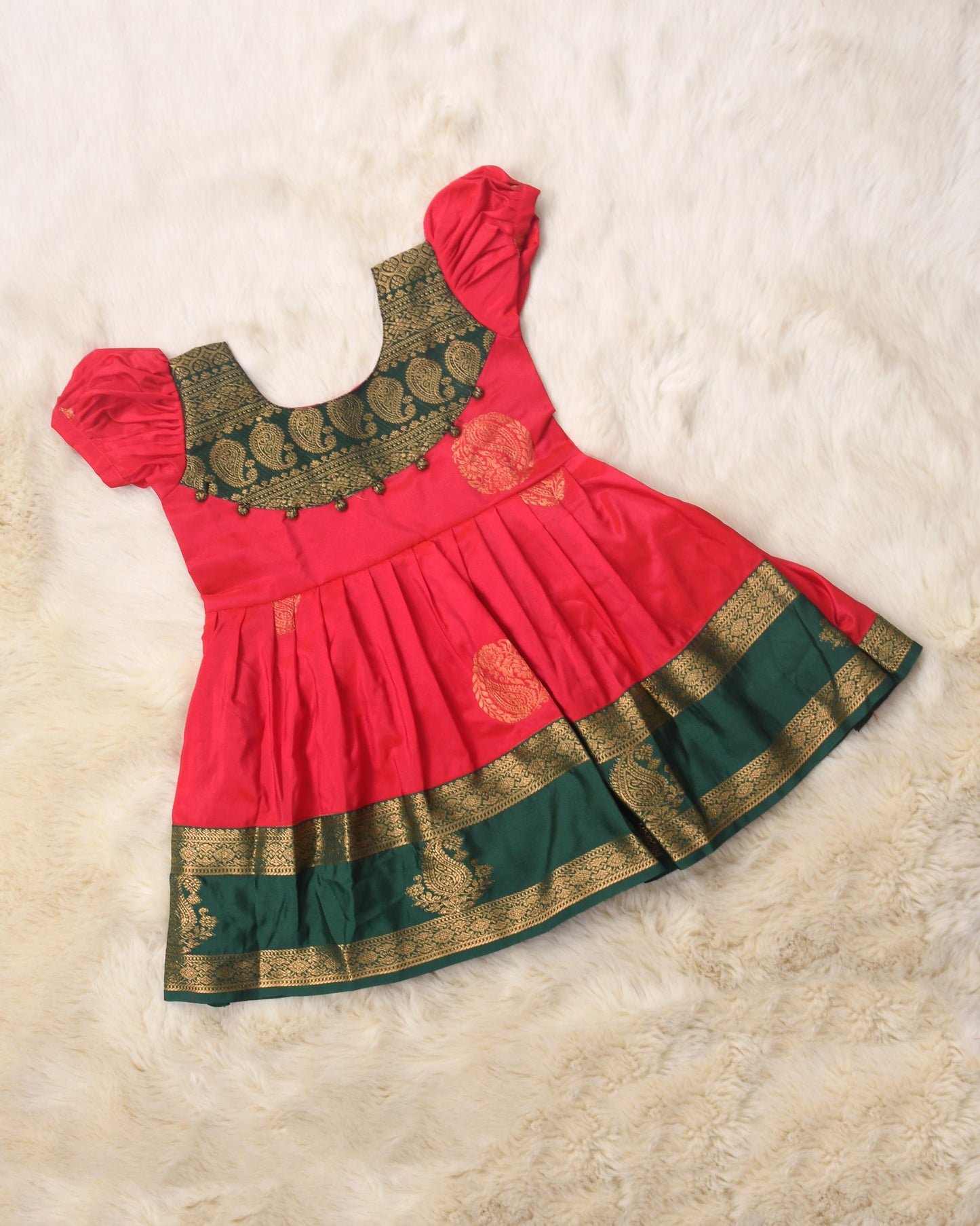 Saadhavi - Orange with bottle green pattu silk ethnic wear for baby girl