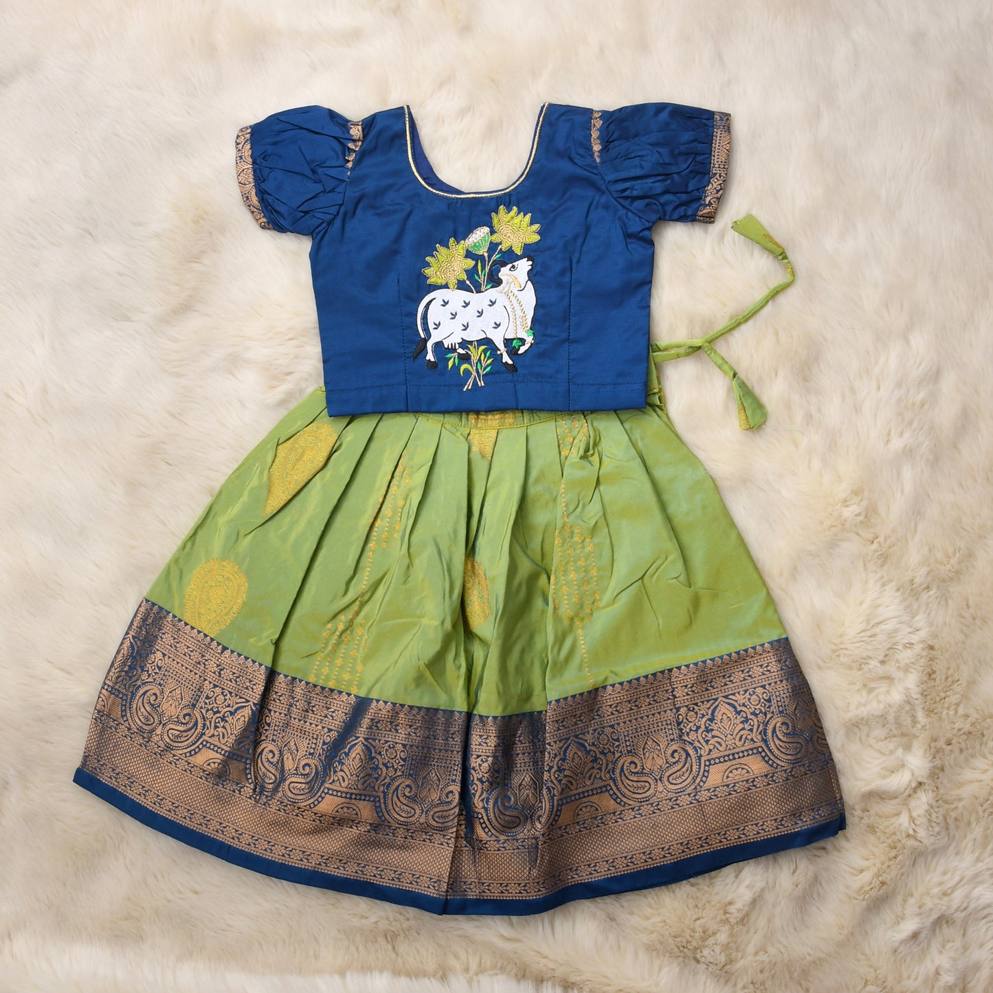 Devi - indigo blue and lush green traditional langa blouse kamadenu cow embroidered zari border ethnic wear pattu pavadai silk for baby girl