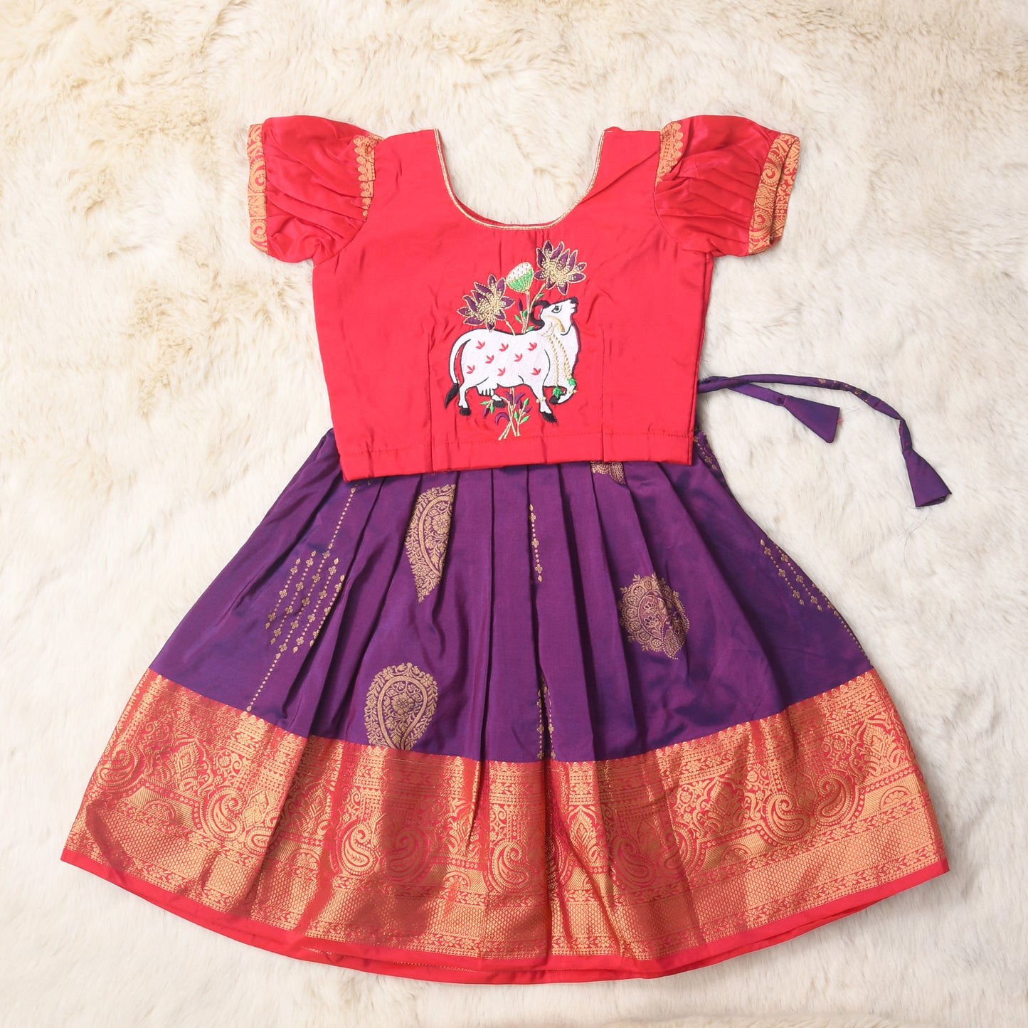 Devi Kanya Kumari - Saffron and Royal Purple traditional langa blouse kamadenu cow embroidered zari border ethnic wear pattu pavadai silk for baby girl