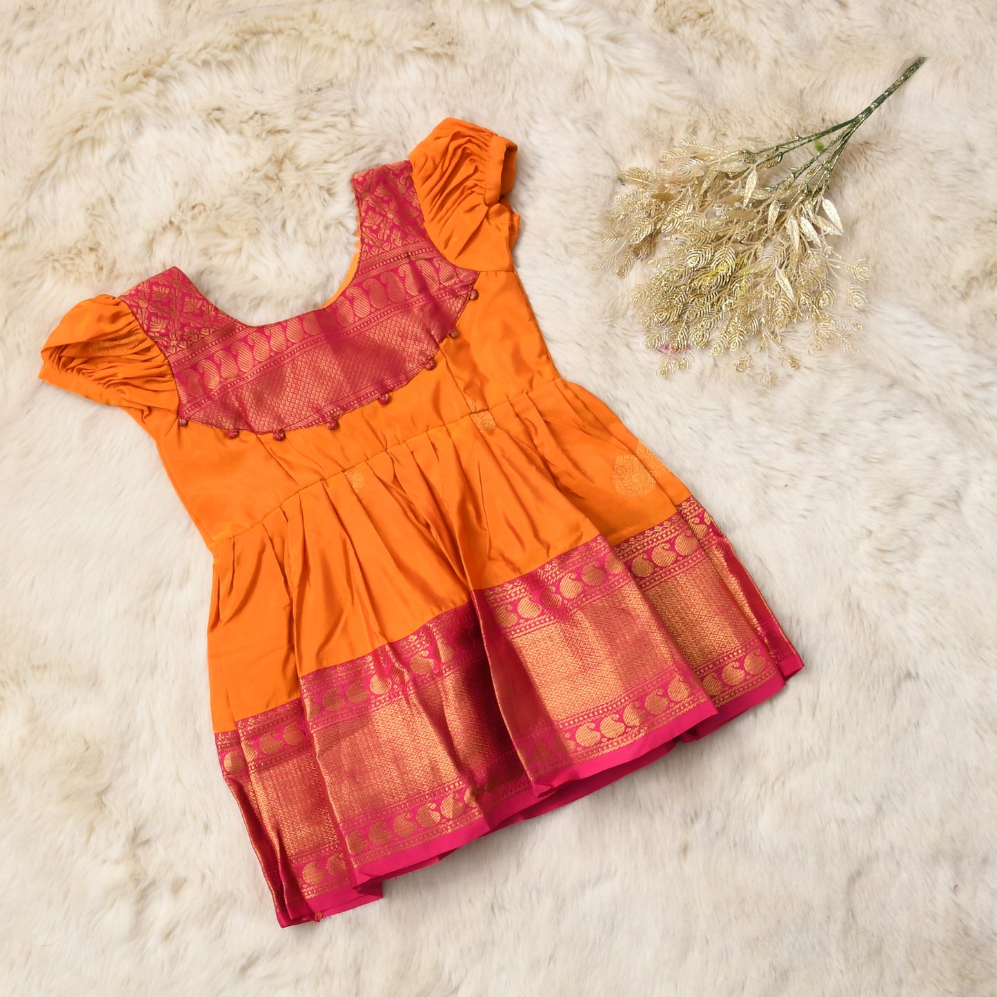 Shanaya - Bright orange with festive pink pattu silk ethnic wear for baby girl