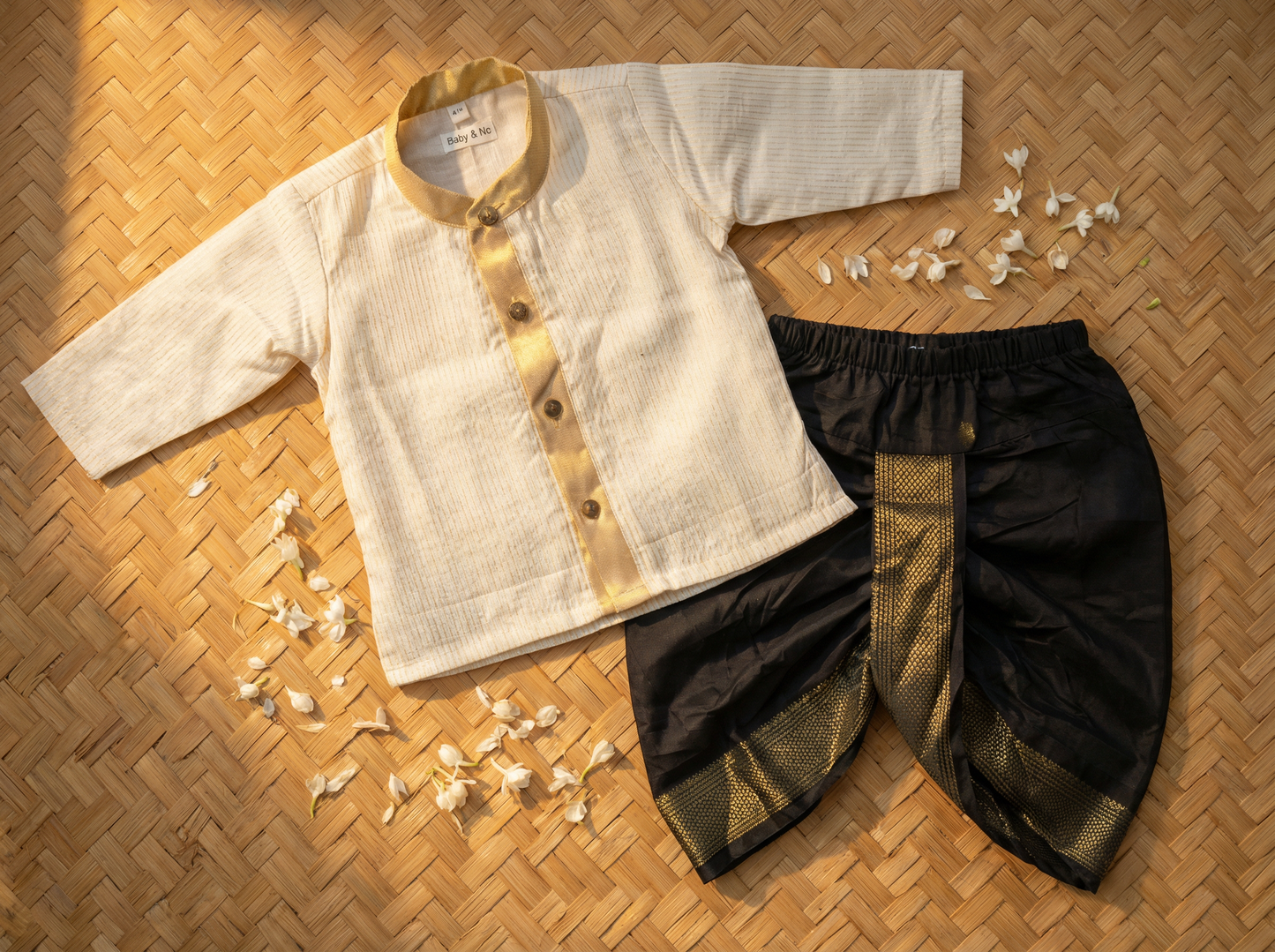 White with gold Kurta and Black diamond design Dhoti for baby boy