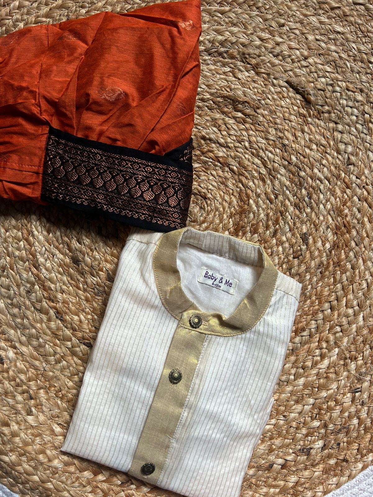 White with gold Kurta and orange with black Dhoti for baby boy