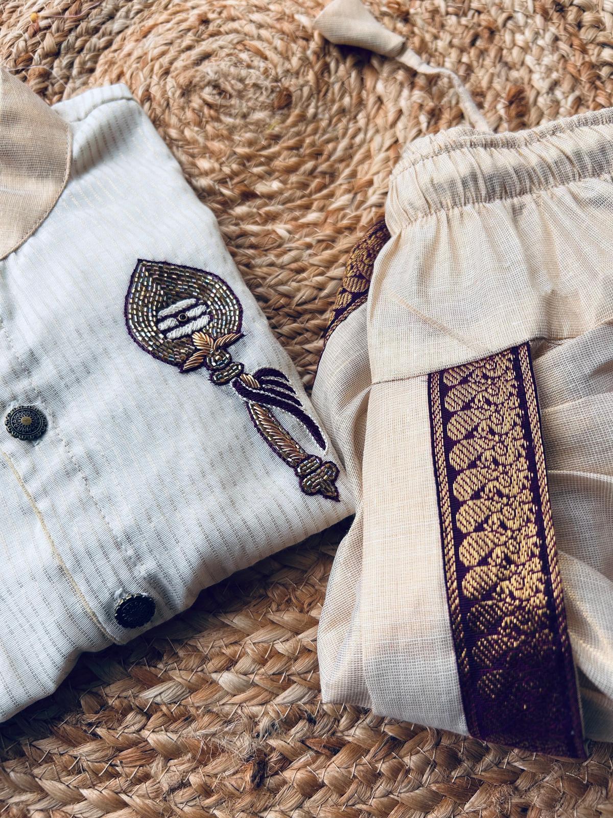 White and gold Muruga trishul embroidred Kurta and Reshme Beige and Dhoti for baby boy